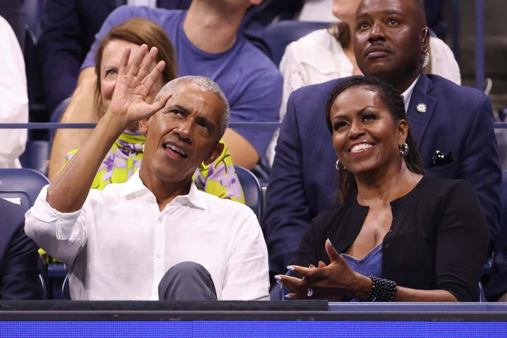 Former President of the United States Barak Obama and former First Lady Michelle Obama attend opening night on day one of the 2023 US Open at Arthur Ashe Stadium at the USTA Billie Jean King National Tennis Center on August 28, 2023 in the Flushing neighborhood of the Queens borough of New York City/ GettyImages/Photo by Jean Catuffe/GC Image